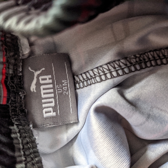 Puma black & red patterned athletic shorts - Picture 2 of 2